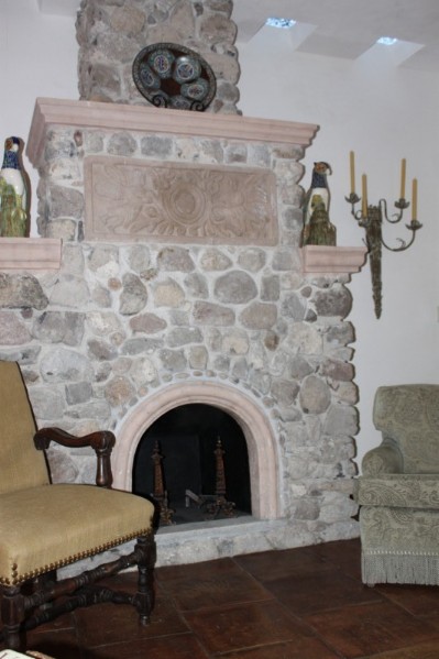 Stone Fireplace with Terracotta Tile Floor